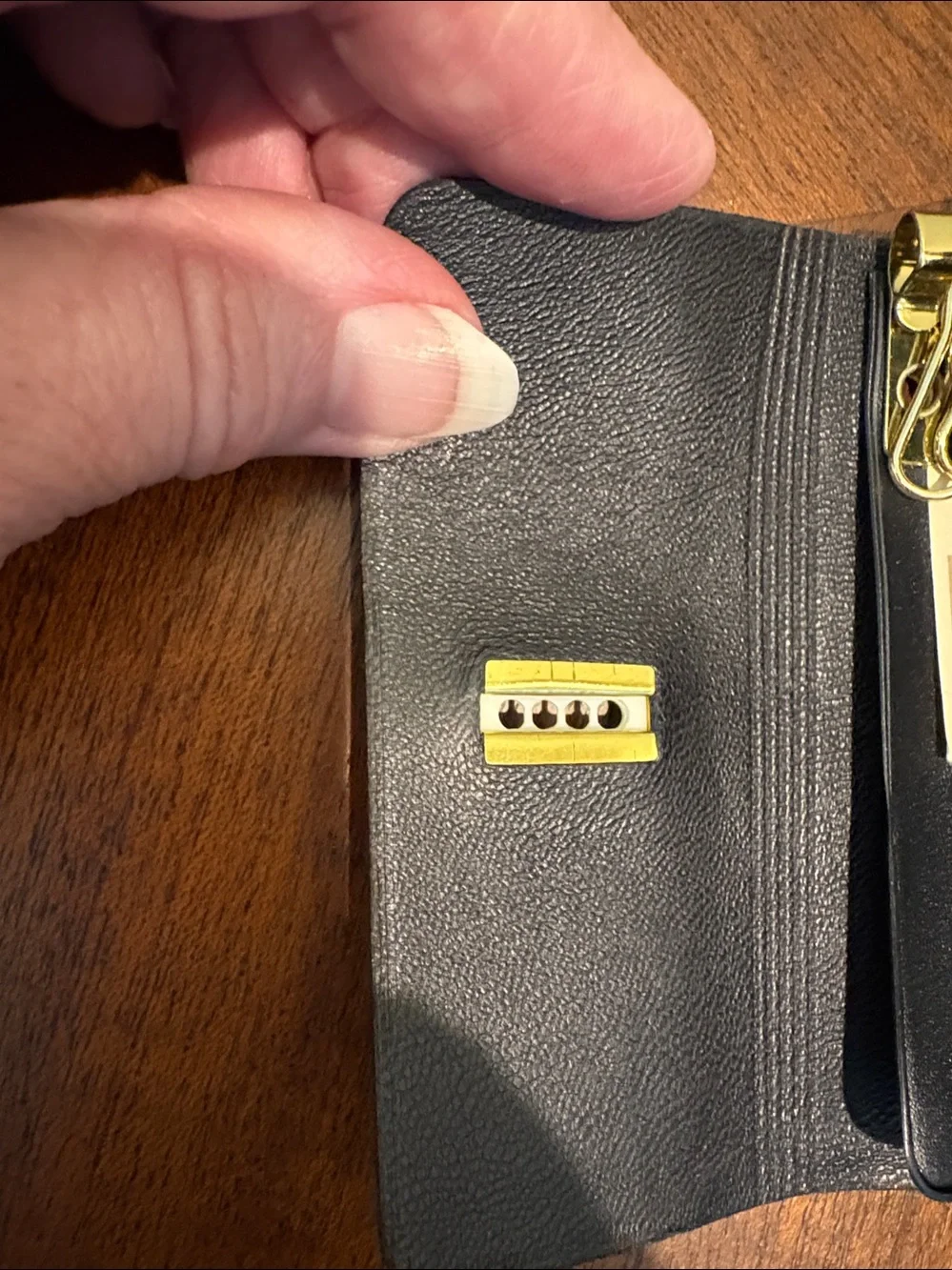 Rolfs cowhide” compact clips